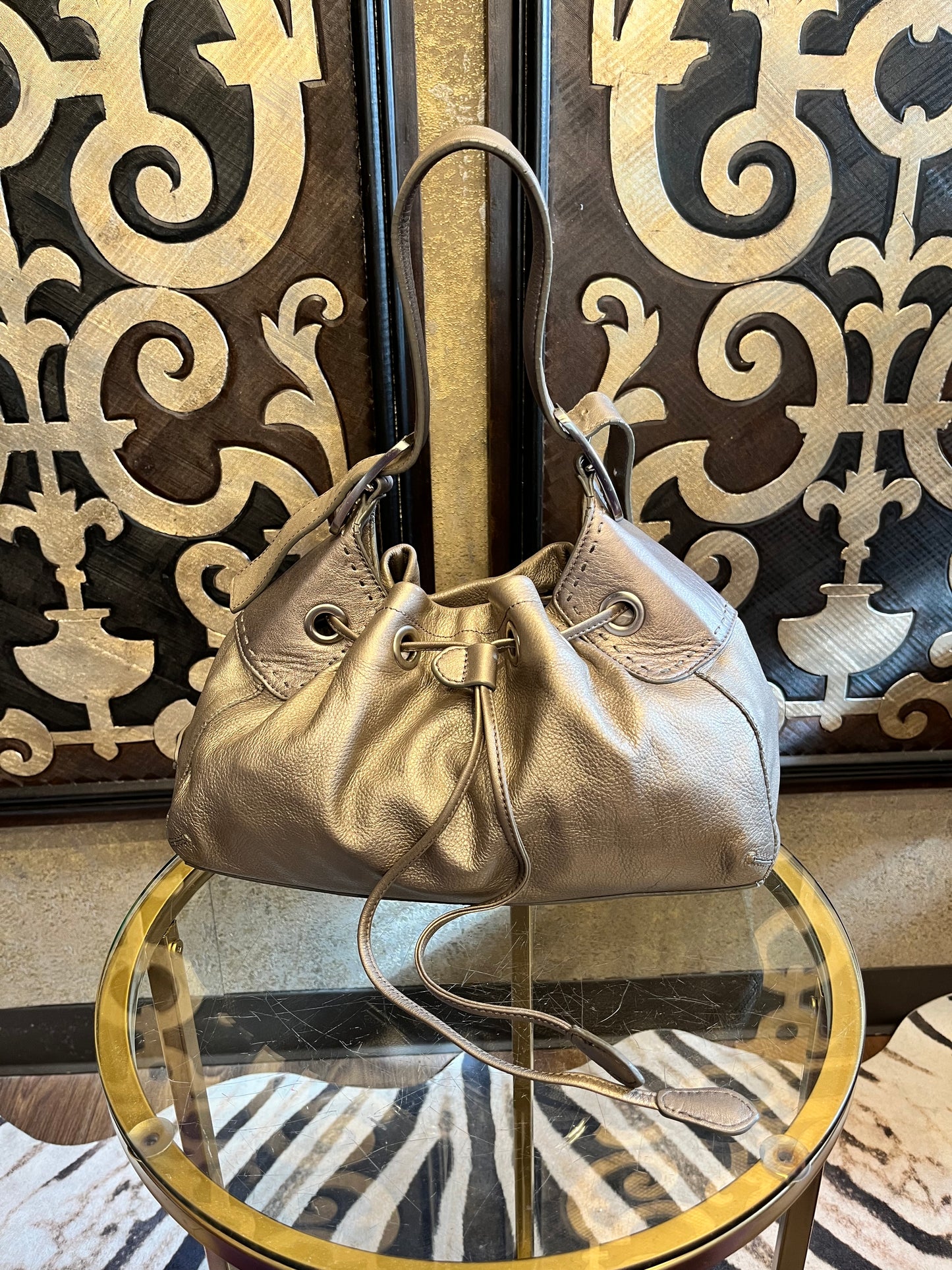 Cole Haan metallic pewter leather draw string handbag