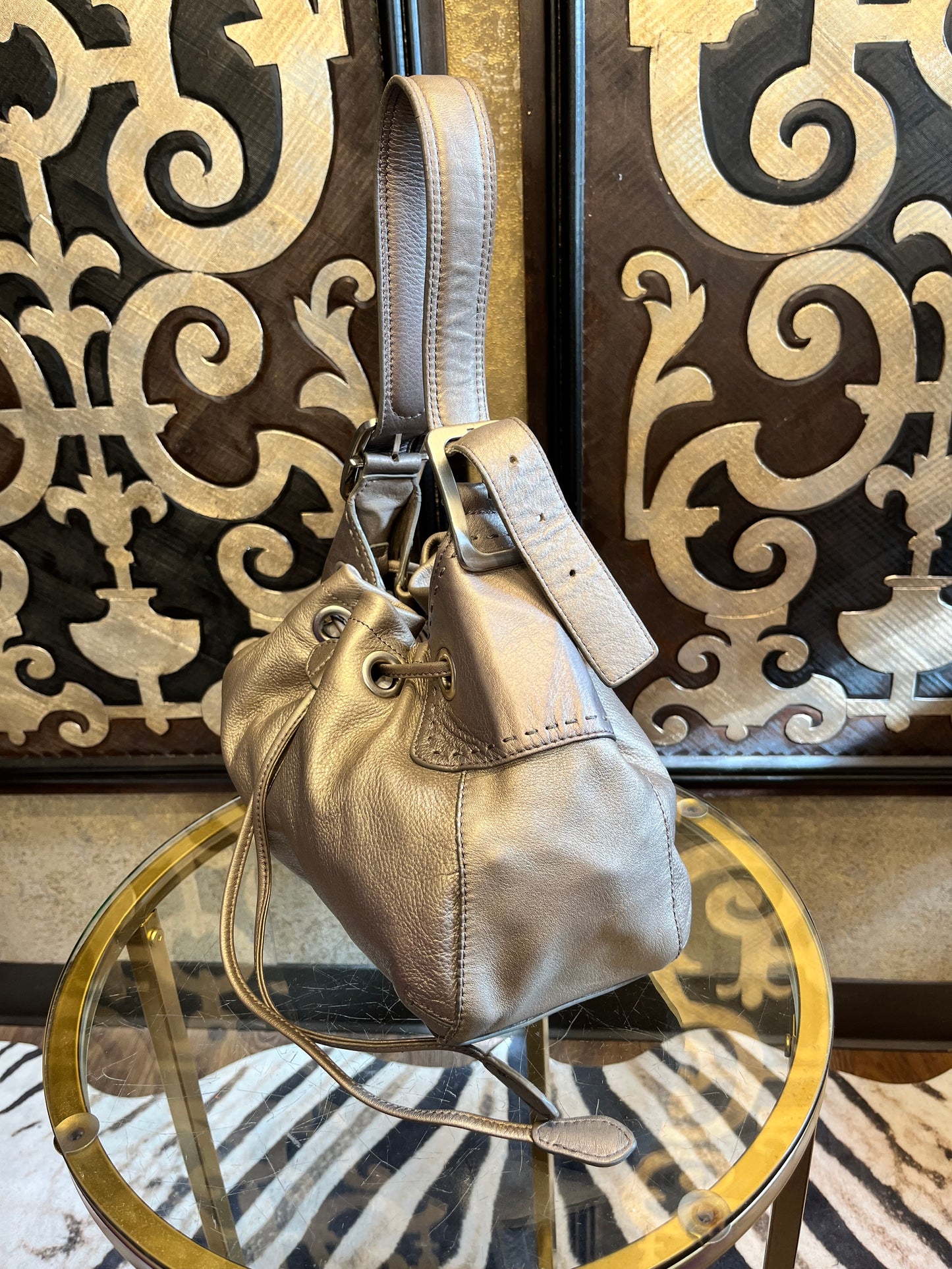 Cole Haan metallic pewter leather draw string handbag