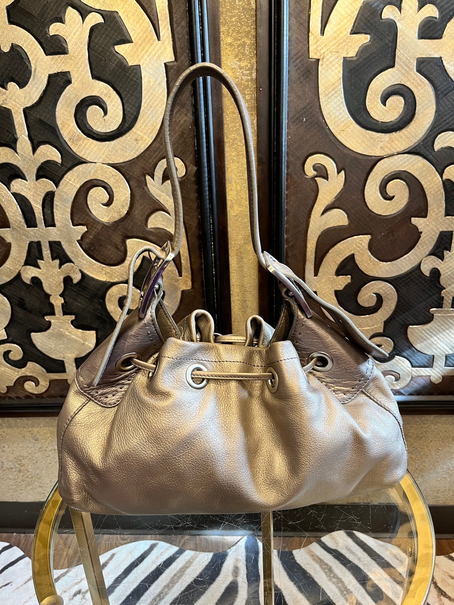 Cole Haan metallic pewter leather draw string handbag