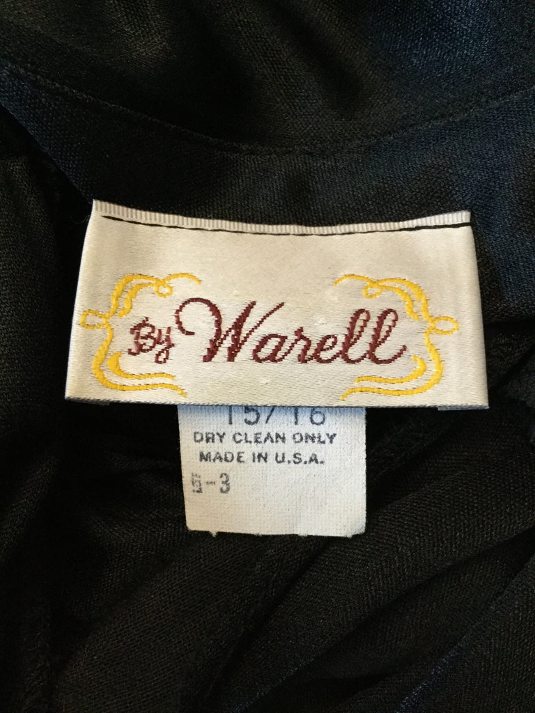 Vintage black jeweled drapey dress