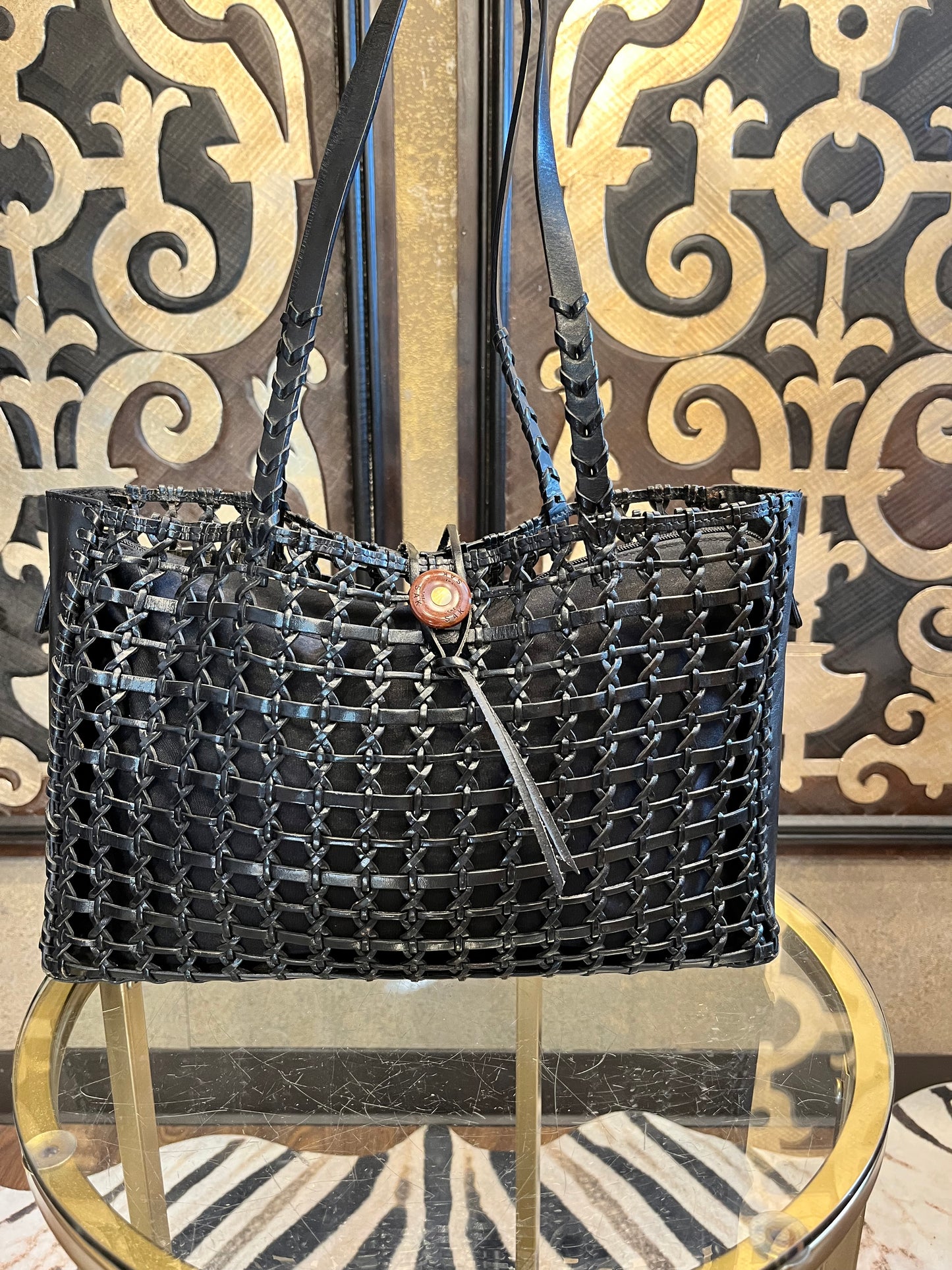 The Sak black woven leather lining insert handbag