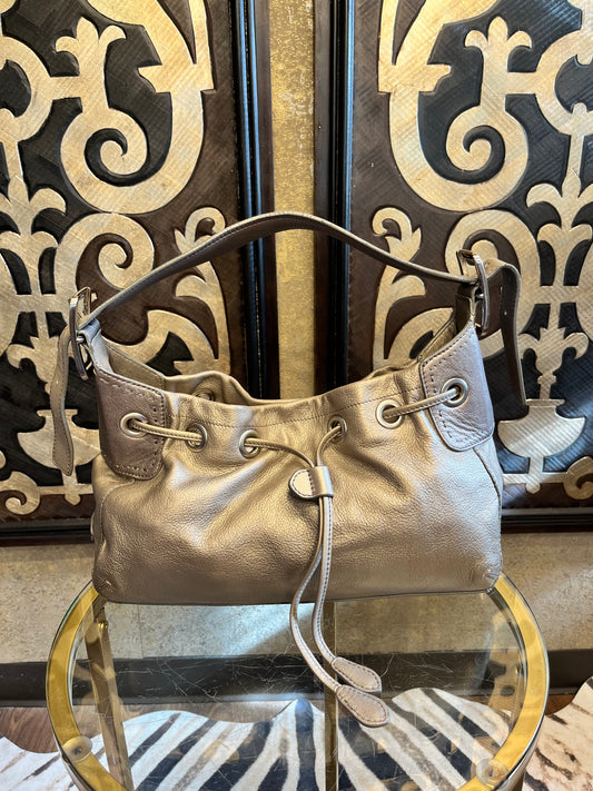Cole Haan metallic pewter leather draw string handbag